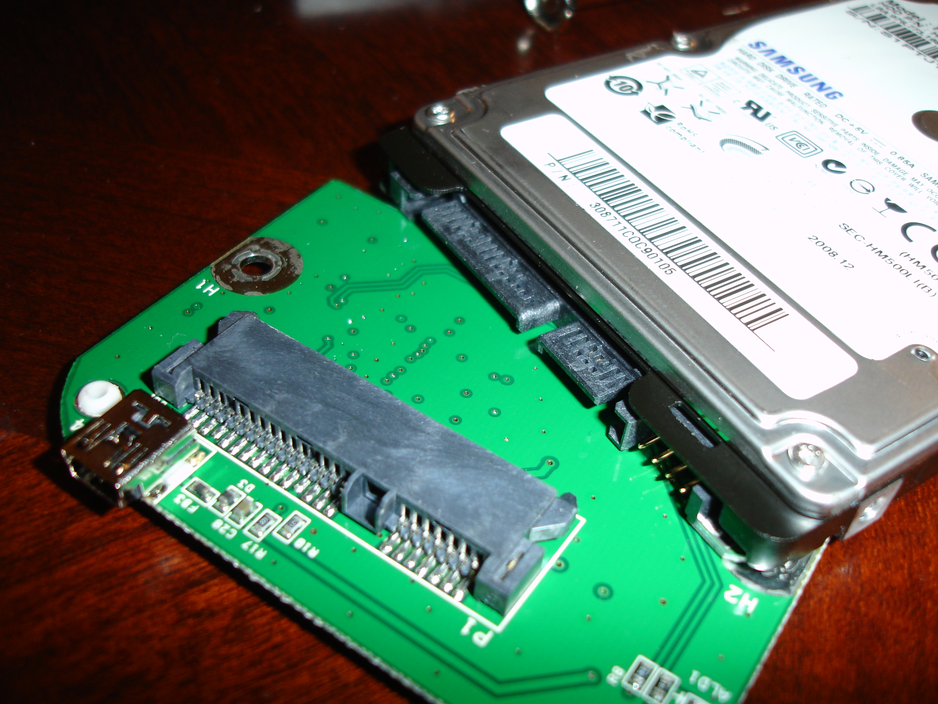 Once you remove the screws connecting the drive to the controller, you can easily disconnect it