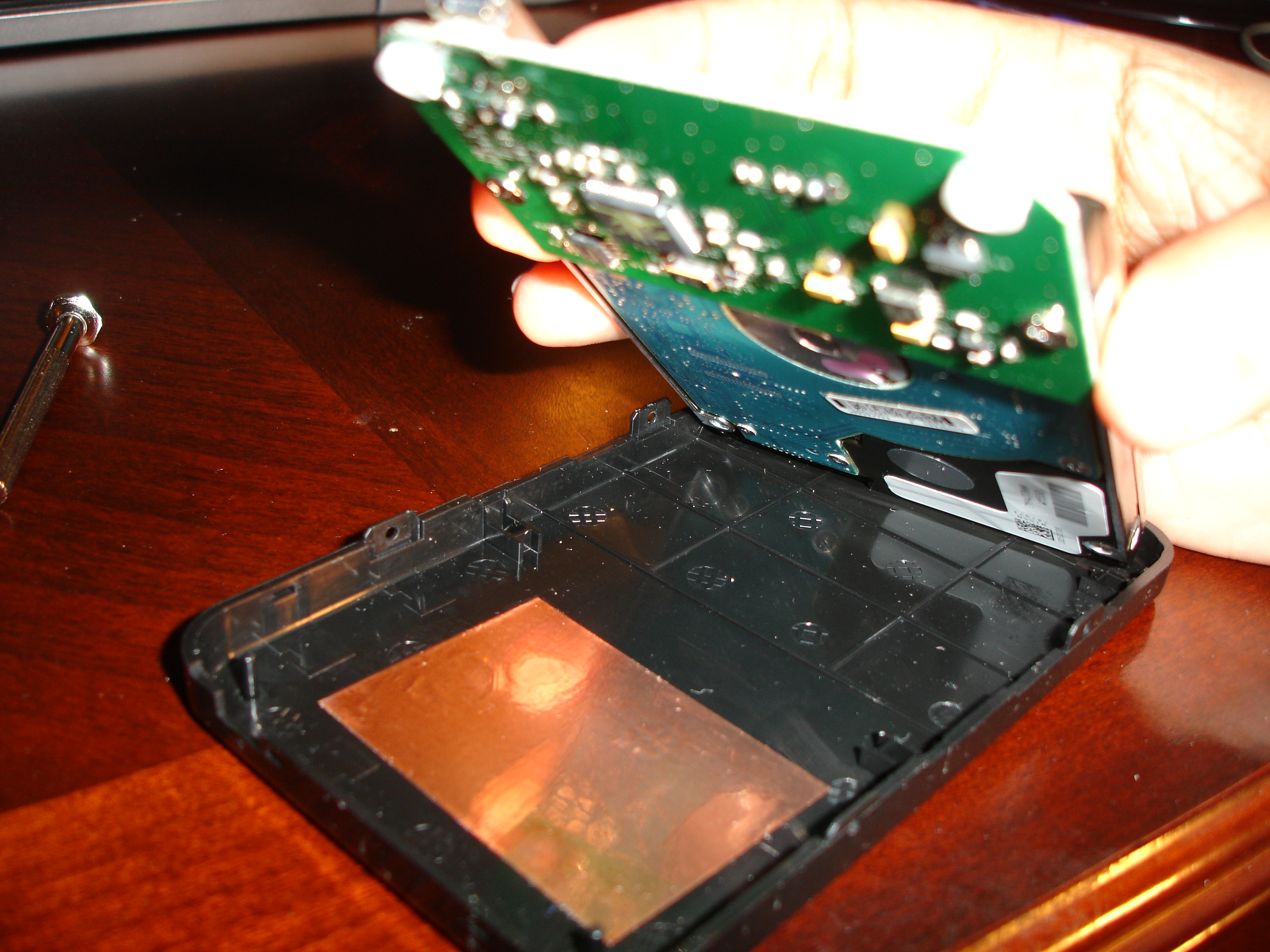 Removing the hard-drive and controller from the bottom case
