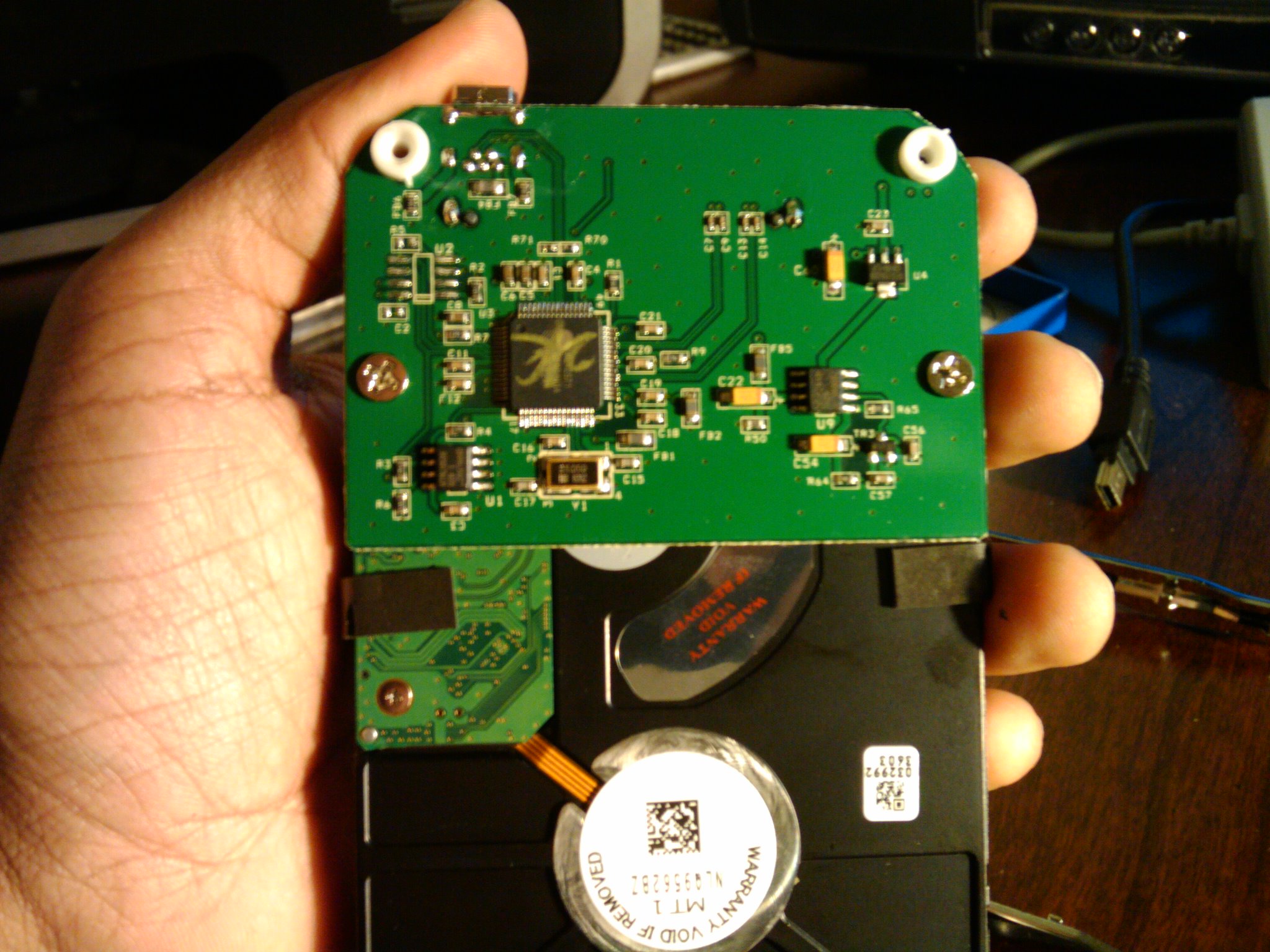 Controller attached to drive by two screws