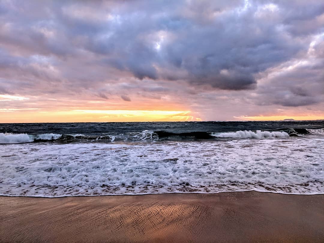 Sunrise at Pounder’s Beach in Laie, Hawaii.