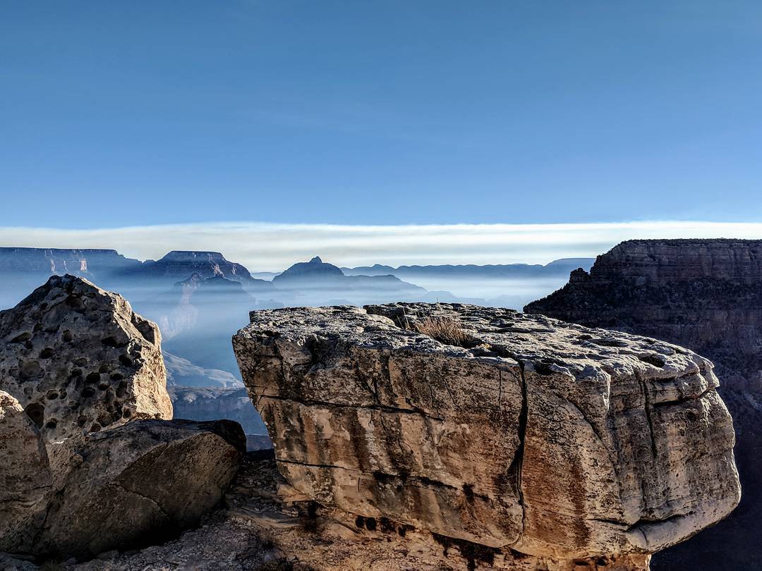 Capstone made of limestone at the South Rim of the Grand Canyon. The clouds (fog from where we we…​